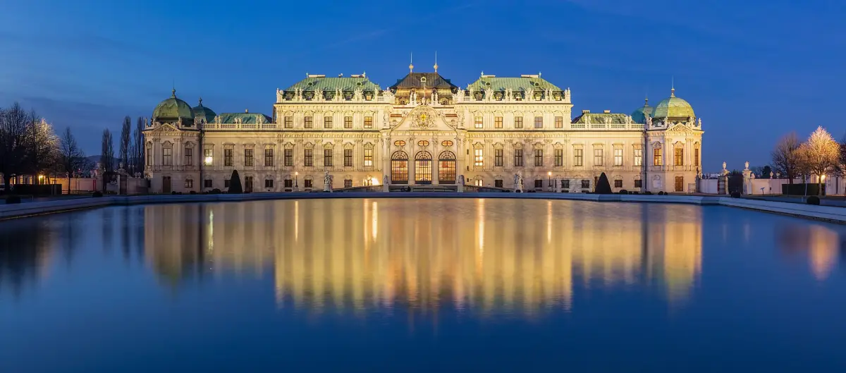 The Upper Belvedere reflected in its pond at dusk